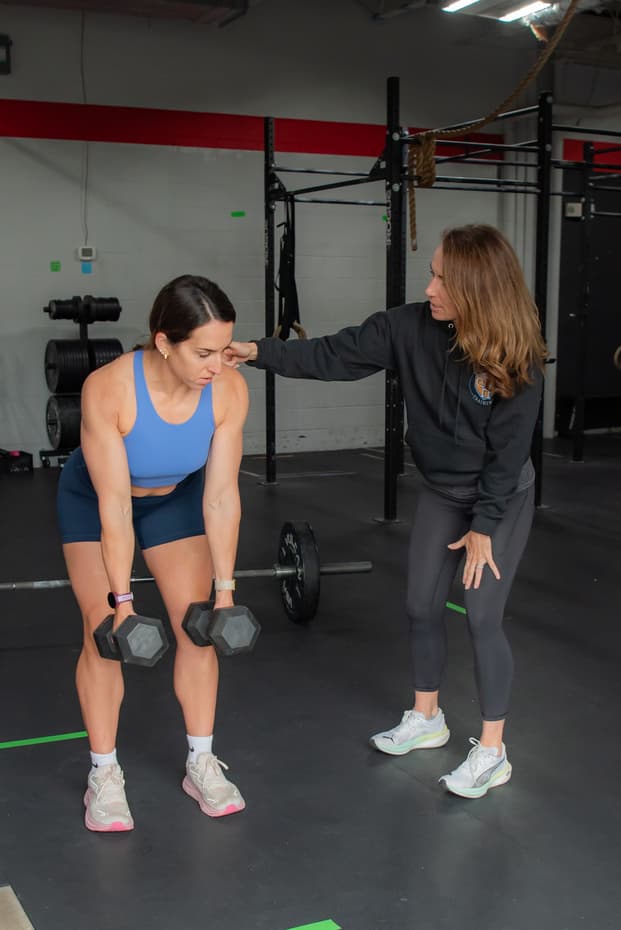 A coach working through a baseline assessment with a client during onboarding